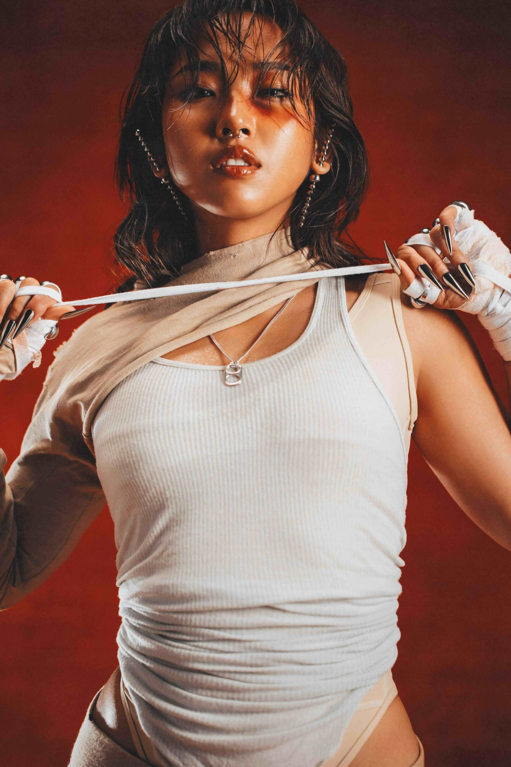 Exclusive: MILLI Turns Up The Heat With Her Latest Album HEAVYWEIGHT